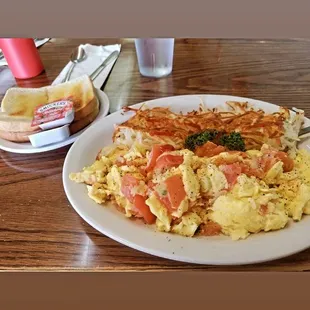 Scrambled eggs with stewed tomatoes and onions