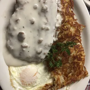 Chicken fried steak, eggs, hash browns and toast