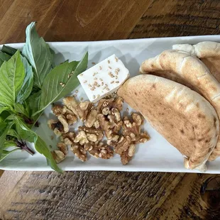 Complimentary pita, feta, and walnuts