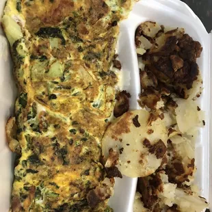 Omelette with American cheese, broccoli, bacon and spinach with hash browns