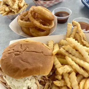 Smoked chicken piled high with vinegar slaw, fries, onion rings, bbq ribs