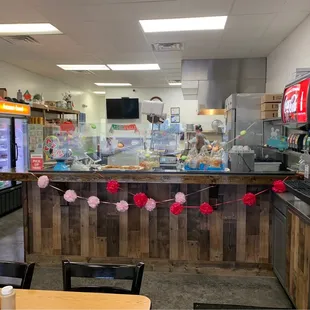 the inside of a small restaurant