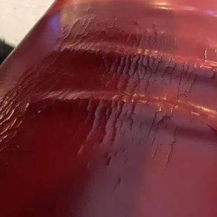 a close up of a red surfboard