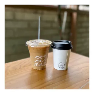 two cups of coffee on a table