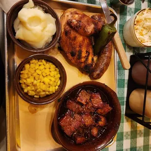 Burnt Ends, BBQ chicken (1/4 white), House made hot link, mashed potatoes and corn.
