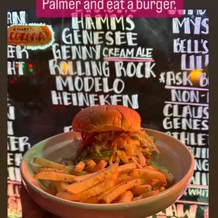 a person holding a plate of food