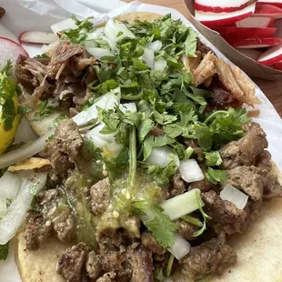 carne asada taco and carnitas taco