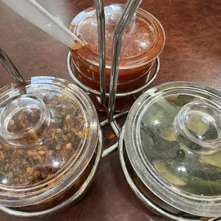 a variety of condiments on a table
