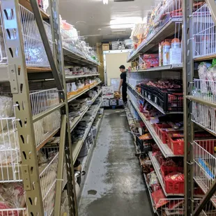 a man in a store aisle