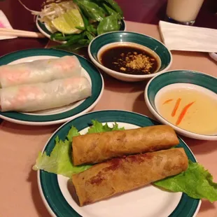 Summer and spring rolls with peanut and fish sauces