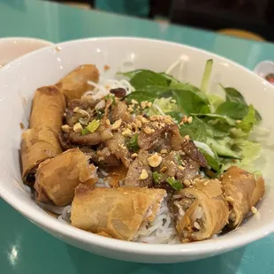 64. Grilled pork with spring rolls