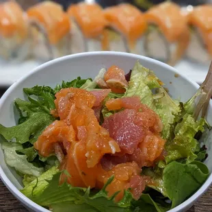 Sashimi salad (lemon roll in background).