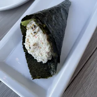 a sushi roll on a plate