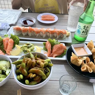 lemon roll, salmon sashimi, cream cheese wontons, spicy garlic edamame, cucumber salad, chamisul fresh soju hehehe