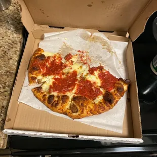 a pizza in a pizza box