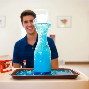 Science with Teacher Ryan!  Colored volcanos!