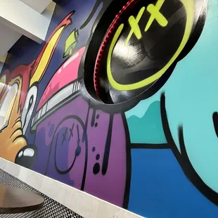 a colorful mural in the lobby