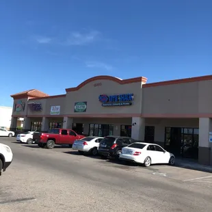 cars parked in front of the store