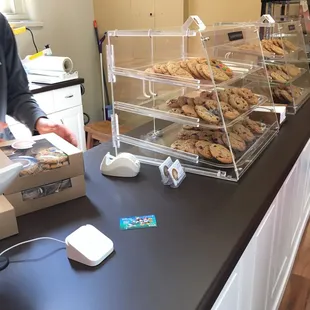 a man standing in front of a counter