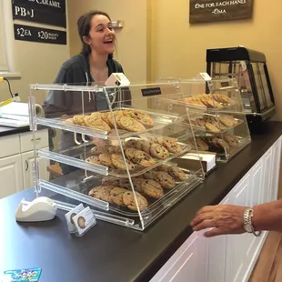 a woman talking to a customer