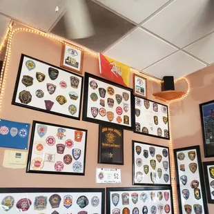 a wall full of badges