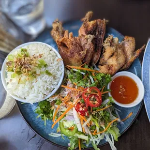 House spice crispy chicken with chili ginger sauce and steam rice.