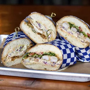a tray of sandwiches on a table