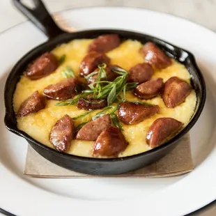 sausage and grits in a skillet