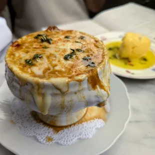 Onion Soup Gratinee. $17. Gruyere, sourdough.