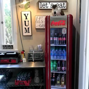 a mini fridge in a small kitchen