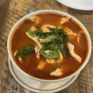S.2 CHICKEN LEMONGRASS SOUP (TOM YUM) g$5.95 Thai hot and sour lemongrass broth, tomatoes, cilantro and lime juice