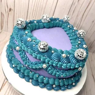 a blue and purple cake