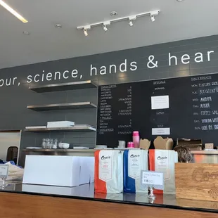 a counter with a chalkboard
