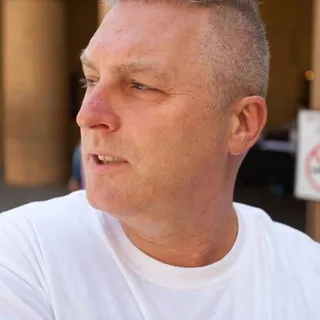 Scott E.