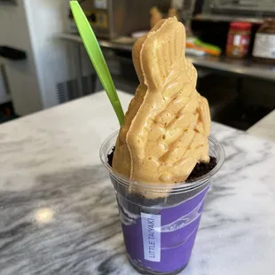 Ube Soft Serve with crushed Oreos and an Upside down fish with custard. Yummy!