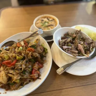 two bowls of food on a table