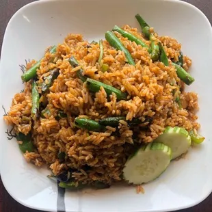 a plate of rice and vegetables