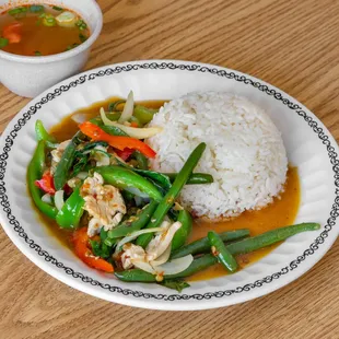 a plate of rice and vegetables