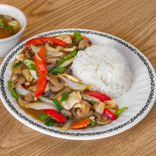 a plate of rice and vegetables