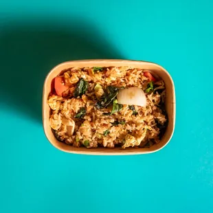 a bowl of rice and vegetables