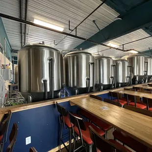 a row of beer tanks