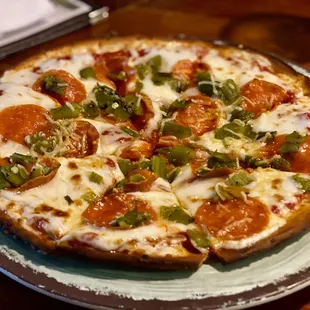 Zia Pizza with green chile. Good, but I think the crust is pre-made.