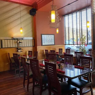 a restaurant with a lot of tables and chairs