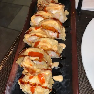 a row of sushi rolls