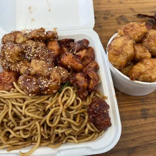 3 meat 2 side combo. Chow mein, sesame chicken, firecracker chicken, and pineapple chicken in the bowl