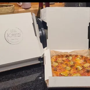 a pizza in a pizza box
