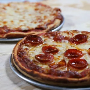 Two pizzas, endless possibilities. Choose your favorites and enjoy a slice of perfection!