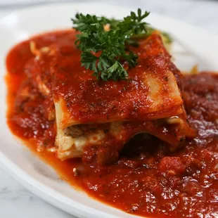 Layers of pasta, rich meat sauce, and creamy cheese. Our lasagna is comfort food at its finest.