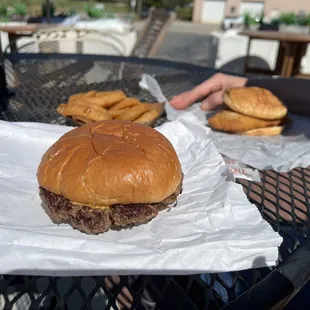 Half pound cheeseburger w/onion rings And the Cod Fish Sandwich. It was delicious.