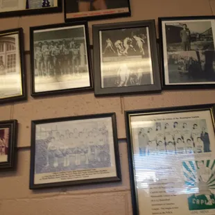 Inside the diner is covered with sports pictures